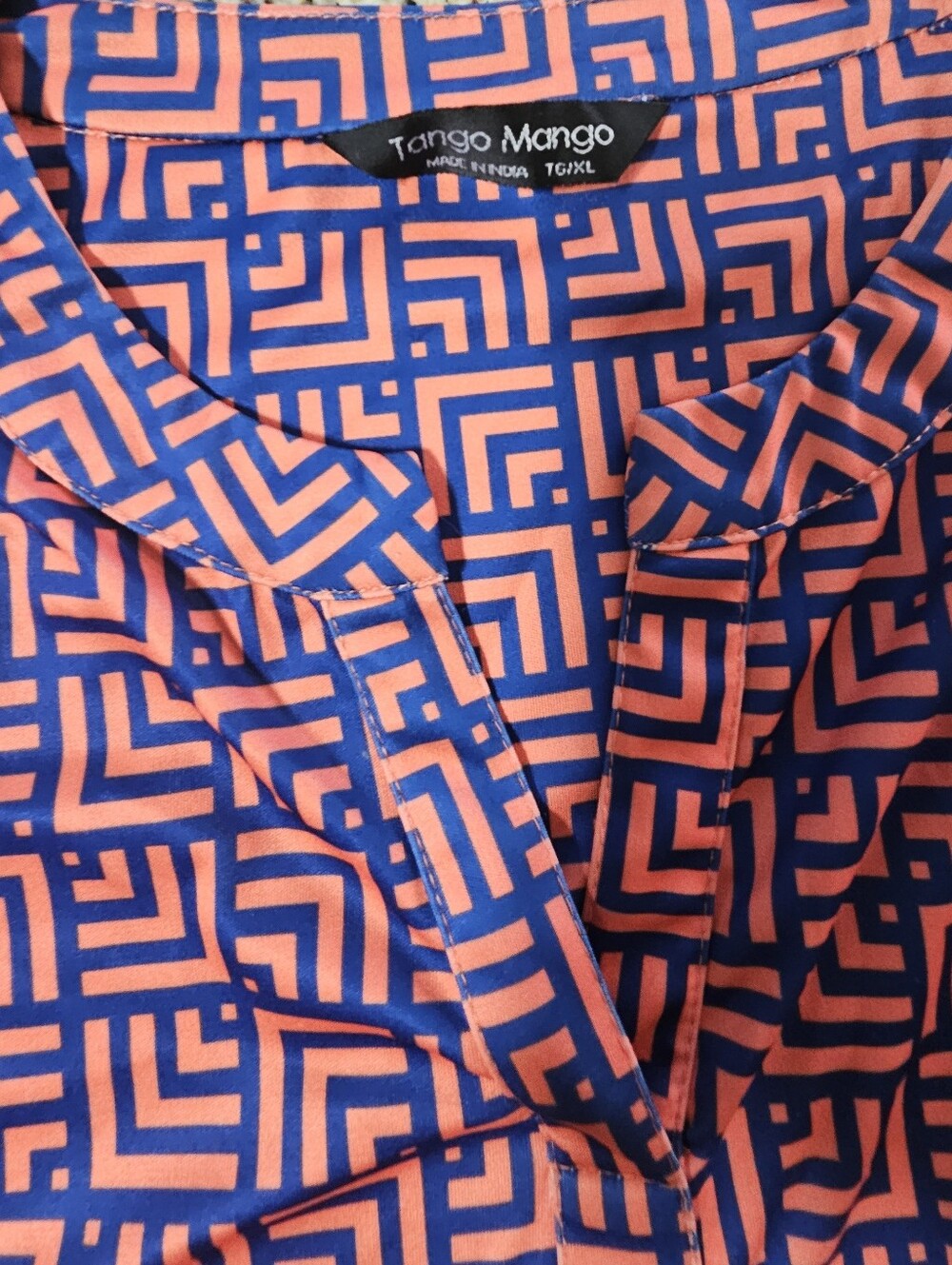 Tango Mango brand sleeveless blouse features a bold geometric print orange blue - Picture 6 of 8